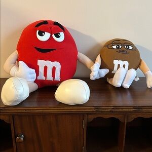 Red guy from M and M candy series, and brown one